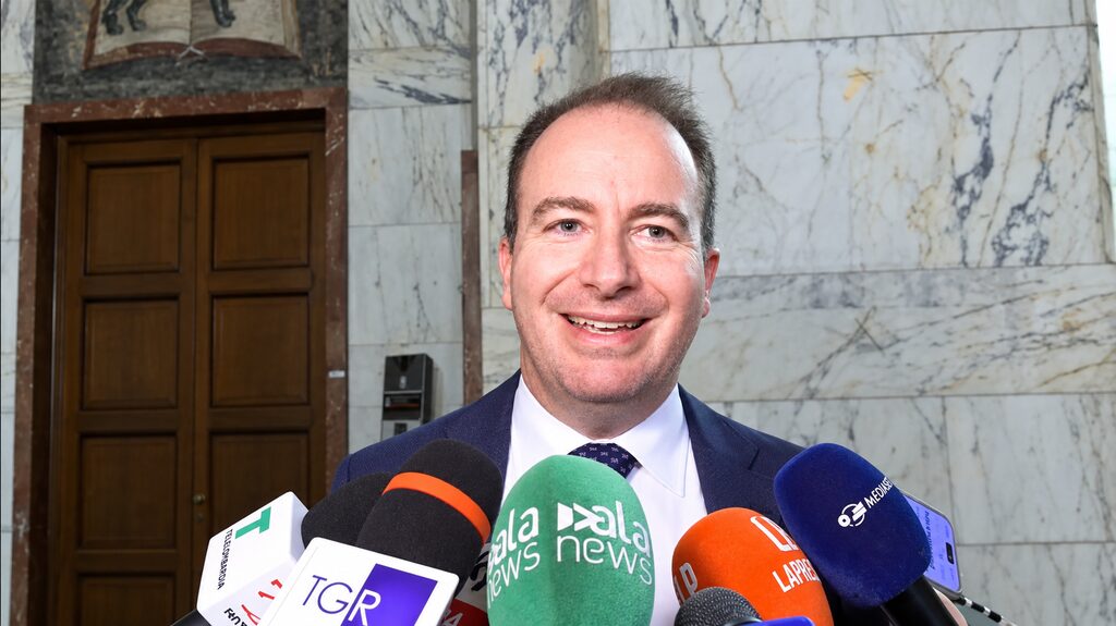 Avv. Marco Bianucci in front of journalists’ microphones